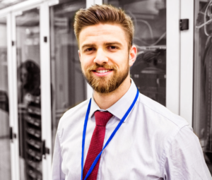 Man with beard in white datacenter